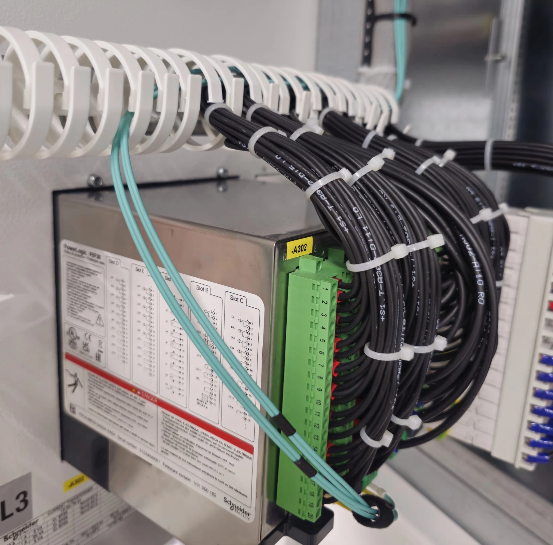 COM.SAR IT Cleaning project photograph: organised wiring and connectors on an electrical measuring device. COM.SAR IT Cleaning project photograph: organised wiring and connectors on an electrical measuring device.